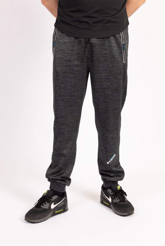 Front view of No Plateau Grey Joggers with reflective detailing.