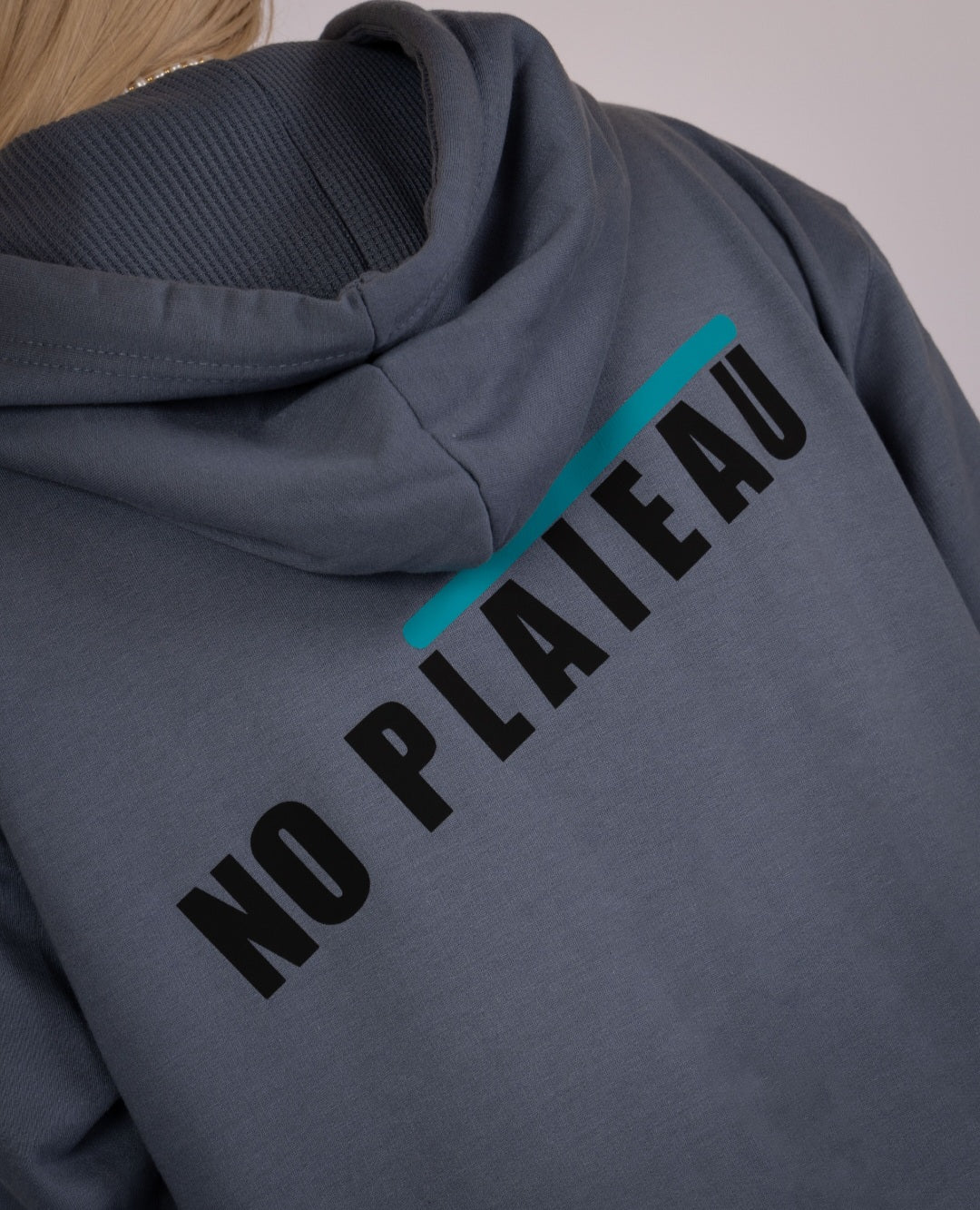 No Plateau Definition Hoodie in Blue—Hood and logo view