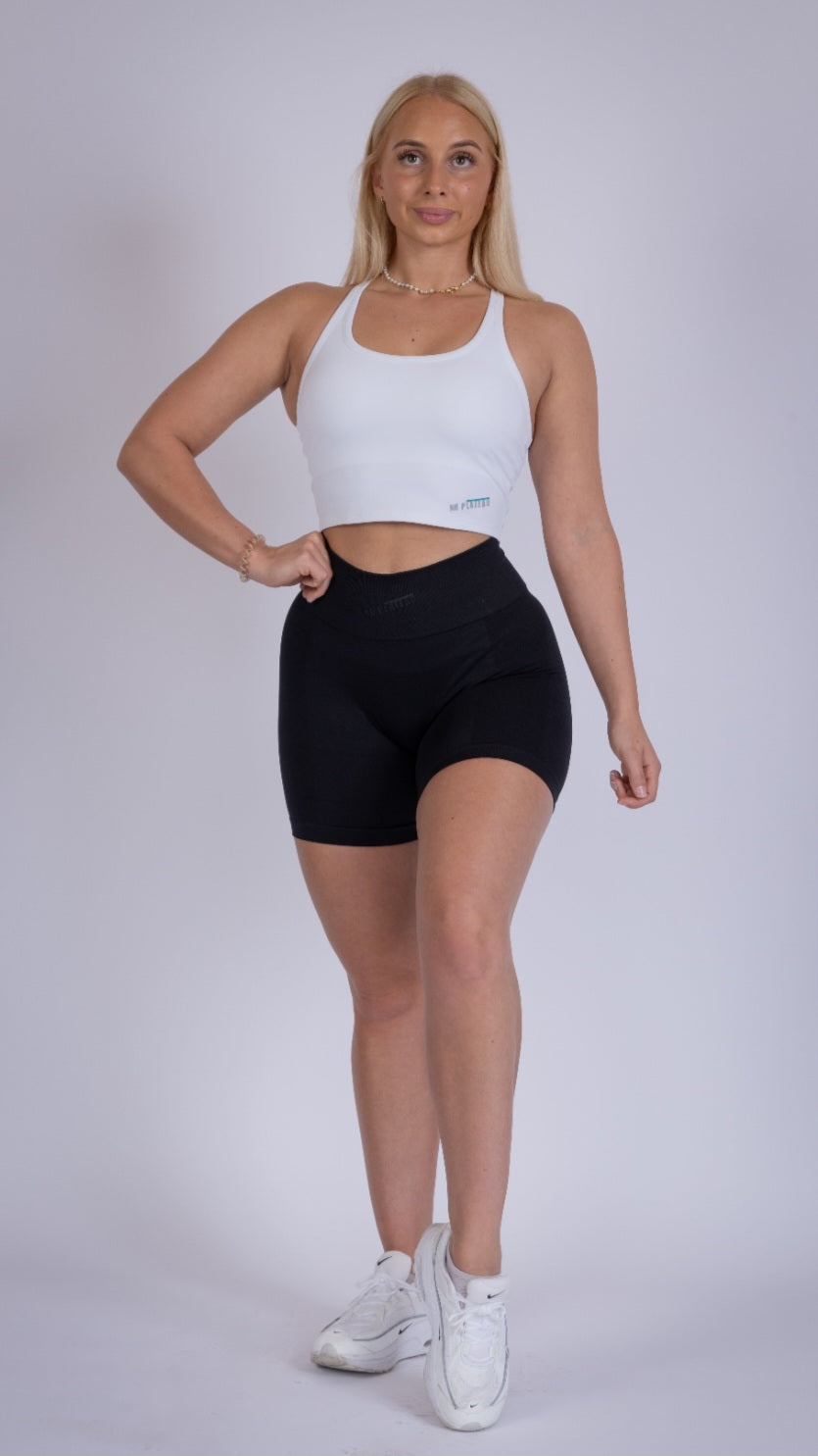 No Plateau Snug Physique Shorts in Black –front pose view 
